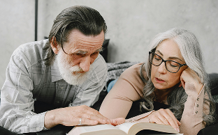 Senior couple reviewing documents