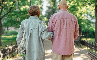 Couple walking in park