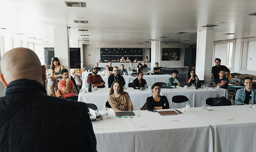 People attending financial workshop