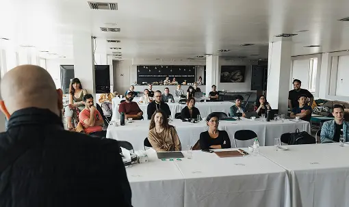 People attending financial workshop
